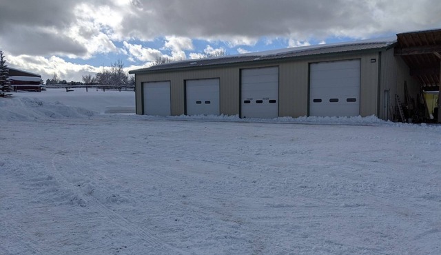 New apartment in shop with Indoor parking for toy trailers or vehicle.