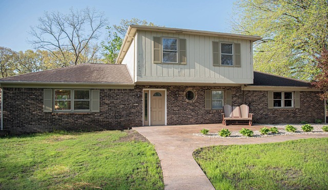 NEW boat slip and wave runner ramps. Great home next to IN Beach and Golf Course