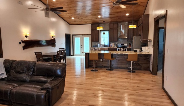 New! Custom built private home on a pond, with large hottub.