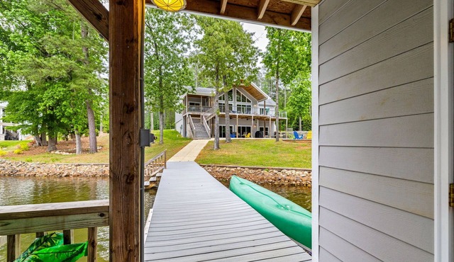 NEW! Family Lake Gaston Getaway 🛶 5BR Dock Kayaks Flat Waterfront Lot