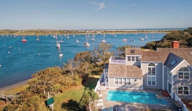 New for 2025! Lovely home with heated pool, dock and the best views! RPMS158