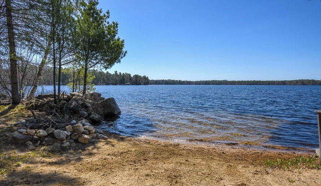 New for 2026! Thomas Pond Cottage with Sandy Beach, Firepit & Lake Views