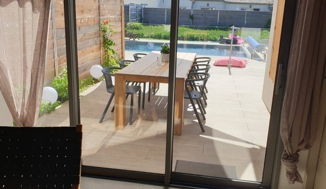 New luxury villa opening onto garden and heated pool 150m from the coast