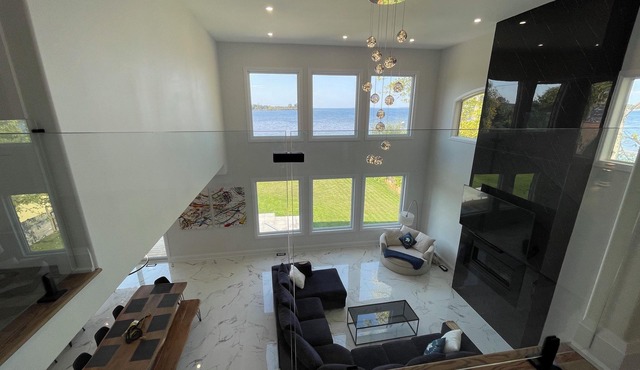 New home|Hot tub|Private beach|Lake front