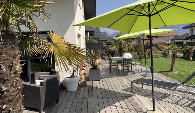 New house between Lake Annecy and the mountains, near the center of a residential area.