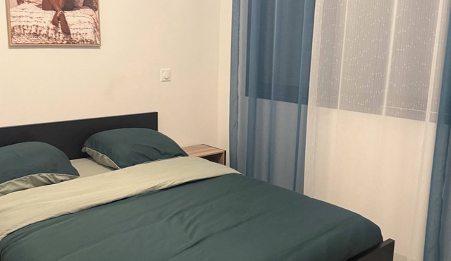 New house or town center + parking space