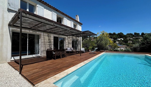 New house with swimming pool and large outdoor terrace.