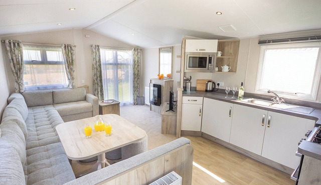 New in 2018. 12ft-wide contemporary caravan with one double and two twin.