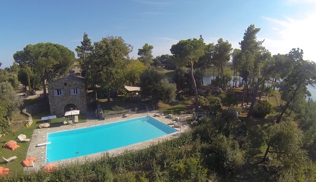 NEW. Large traditional Corsican property, feet in fresh water .