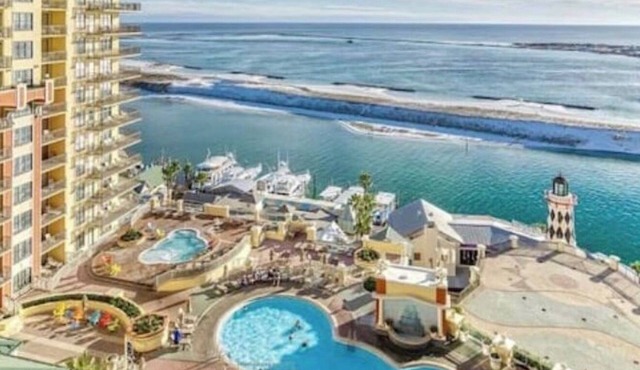 NEW LISTING 3bd, Emerald Grande Condo, Harbor and Gulf Views w/beach services!