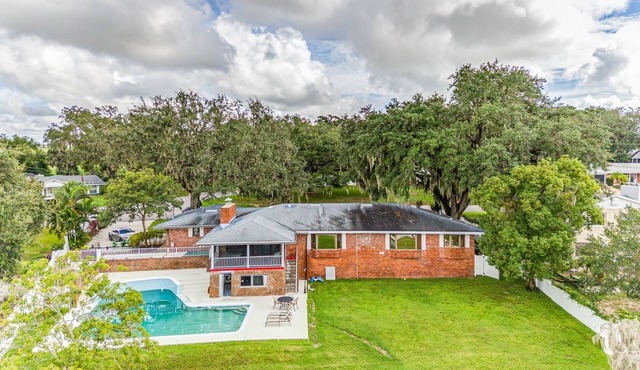 NEW LISTING! Beautiful Lake View Retreat Drivable to Theme Parks