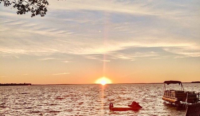 New Listing! Lake front cottage with 100' of private sandy beach