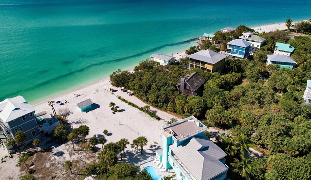 NEW LISTING! OCEAN PARADISE! WOW! BEACHFRONT 4 bdrm, HEATED POOL, BAR, 2 CARTS