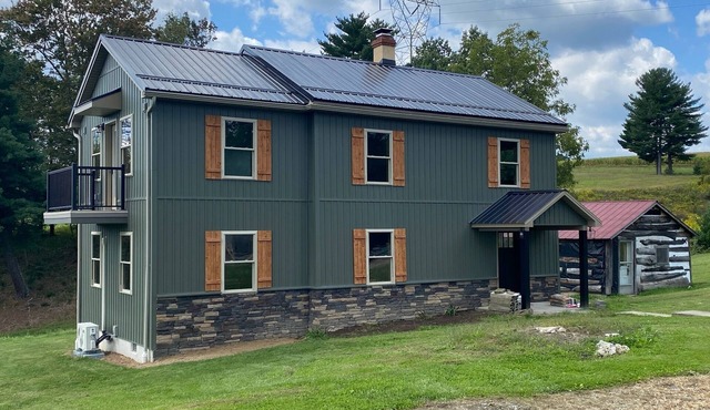 New Listing! Remodeled log farmhouse with lake view!