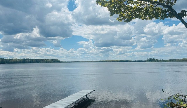 NEW LISTING! Spacious 4-bedrooms lake front retreat in delightful Alpena area.