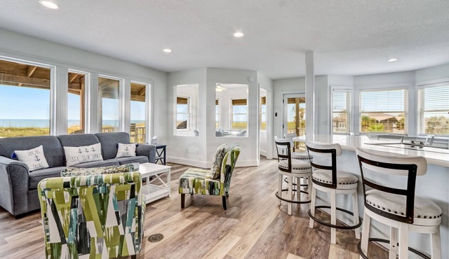 New Listing! Stunning Oceanfront 4-bedroom 3 bath house nestled on the quiet end of the island.