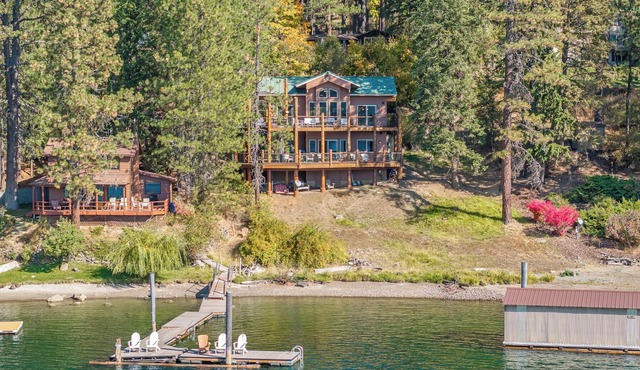 New Listing! The Ultimate CDA Lakehouse | Views, Private Dock & Decks