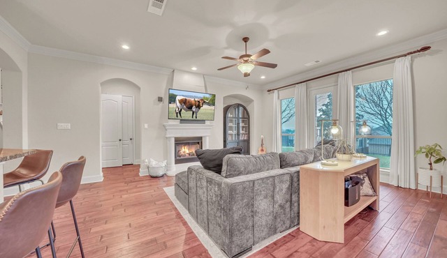 New luxury home in The Bluffs at Heritage, Fort Worth. 5 bedrooms, 4.5 baths, theater room, office spaces, skyline balcony views, gourmet kitchen, and resort-style community amenities. Ideal for families and extended stays.