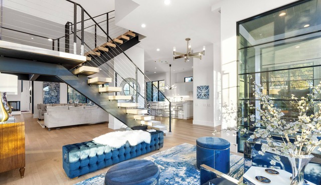 New luxury modern home in Midway Hollow with heated pool, private casita, indoor/outdoor living, designer furnishings, garage, and concierge service. Perfect for families, groups, or extended stays.