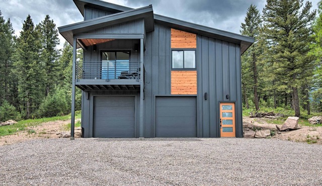 NEW! Modern evergreen cottage on 35 acres with views!