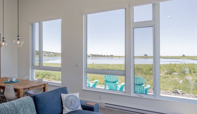 NEW! Modern light-filled cottage. Water views. Walking distance to Hirtle Beach.