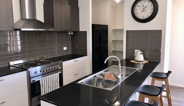 New, modern & spacious in a perfect quiet location only 10 minutes from the city