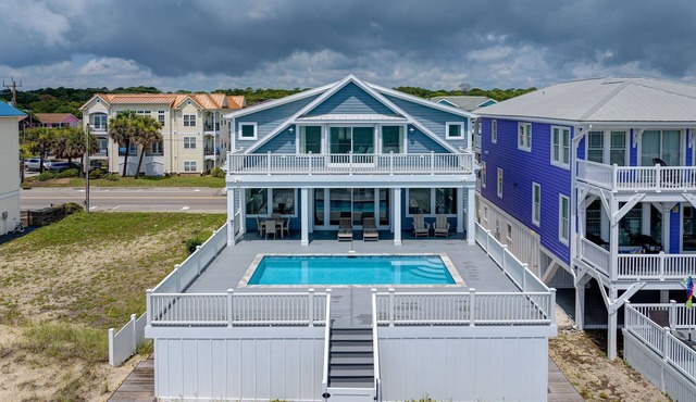 NEW! Ocean Front luxurious 6 bedroom home Pool, Elevator, and on the Beach!