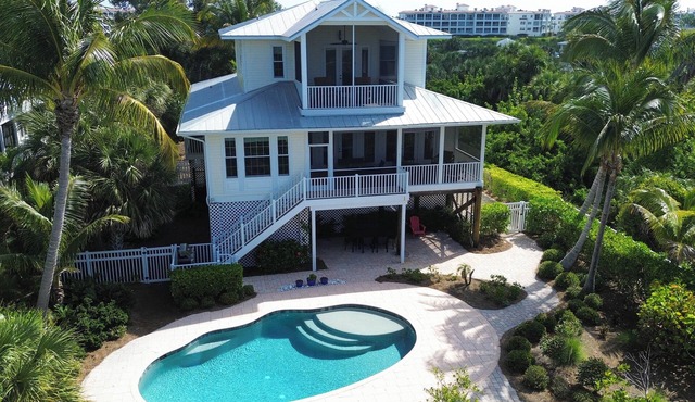 NEW! Palm Island with private pool, garage, screened porches, dock, 2 kayaks