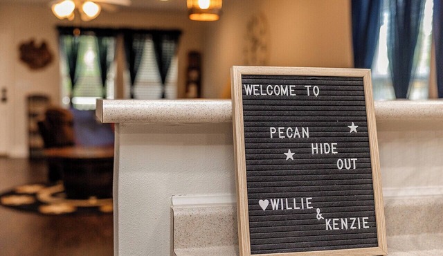 New! Pecan Hide Out is a rustic home with fire pit and tree house!