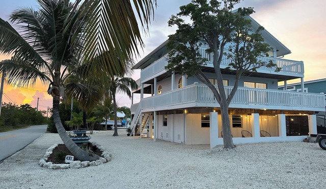 New pool & Huge master suite! Open water views , 2 stories of wrap around decks