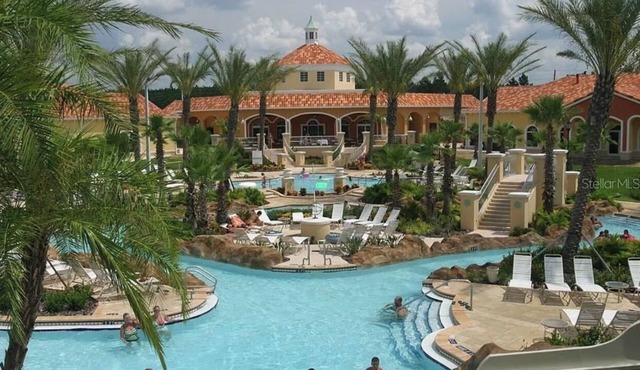 NEW RESORT STYLE TOWNHOME MINUTES AWAY FROM THEME PARKS