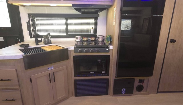 New River RV Travel Trailer with 1 King bedroom and bunks - 2 small children.