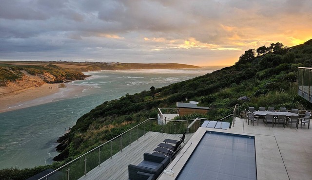 New Spectacular 7 bedroom house on south facing cliff overlooking beach and sea.