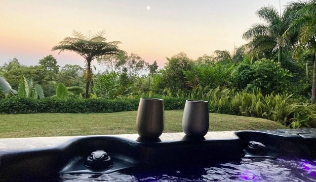 NEW -The Sugar Shack, Ocean views over cane fields from your outdoor Spa Bath