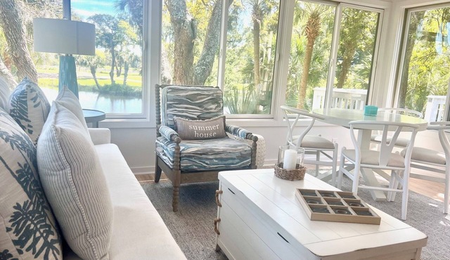 New to Market. Golf & pond views. Refined beach cottage.