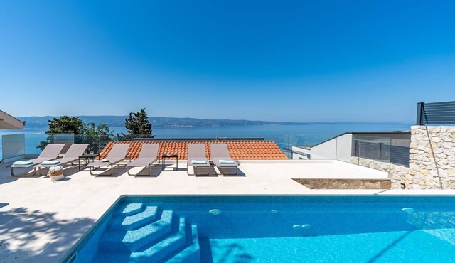 New! Villa Atopos with heated private pool, 5 bedrooms, Cinema room, panoramic sea views