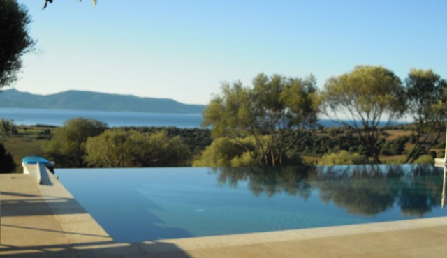 New villa with a private heated pool and a panoramic ocean and mountain view