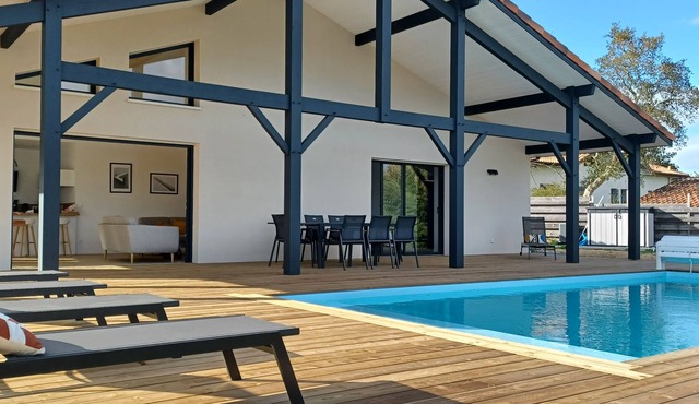 New villa with large wooden terrace 130 m2+ heated pool (May to October)&climate
