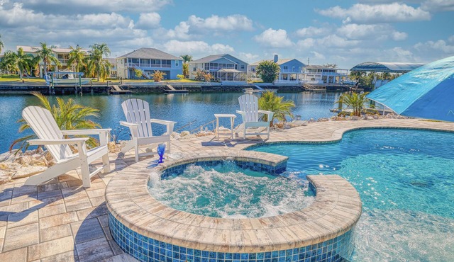 NEW! Waterfront Gulf Retreat w/Heated Pool, Spa, & Mini Golf.