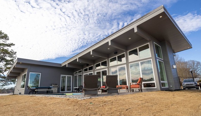 NEW Waterfront Mid-century Modern Home with Heated Pool