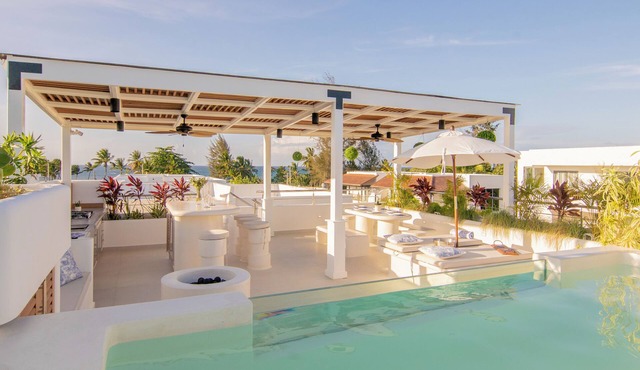 New York Times featured this Beachfront Penthouse w/Dior inspired Rooftop & Pool