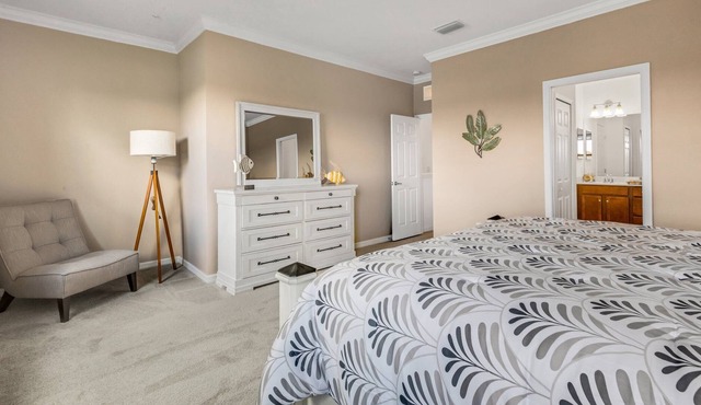 Newer 2022 Immaculate 4/2.5 Townhome Lake View in Resort Style Community