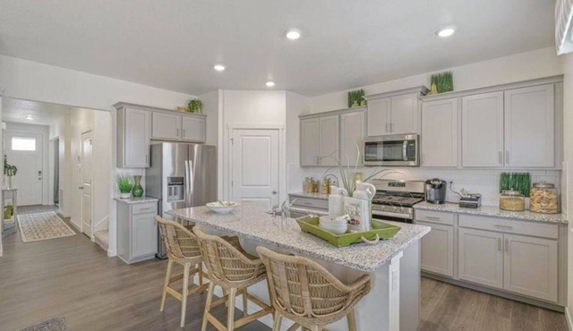 Newer build with 4 bedrooms, large backyard and beautiful mountain views.
