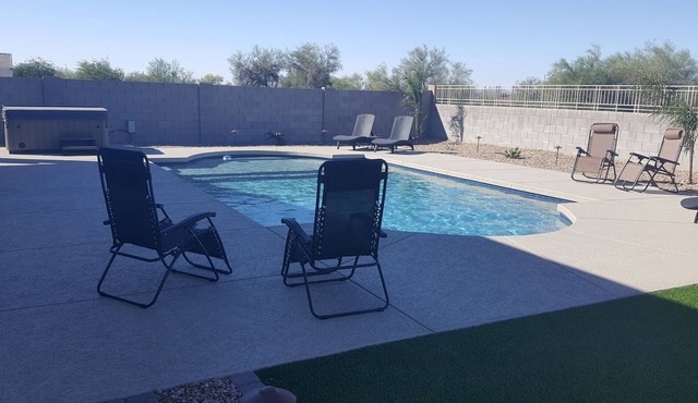 Newer Resort Style 4 bed home Open floor plan with HEATED Pool and Hottub