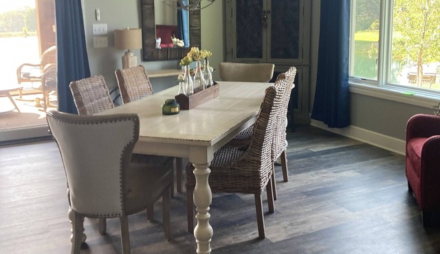 Newly built condo with waterfront views and outdoor entertaining amenities.