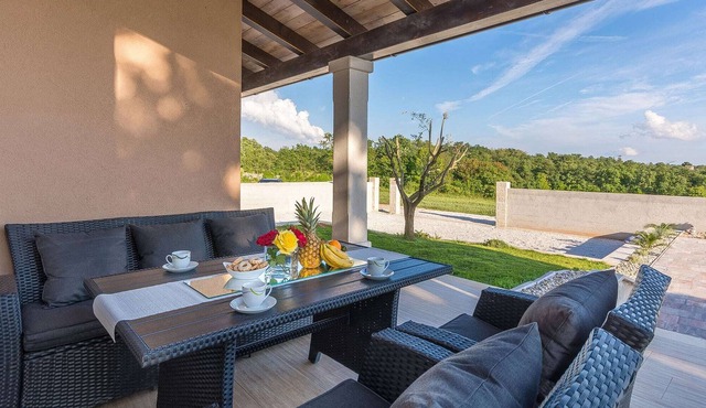 Newly built holiday house with pool and garden ,on a quiet location near Tinjan