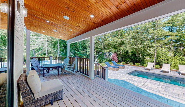 Newly-built home with in-ground pool, hot tub, gourmet kitchen, deck & patio