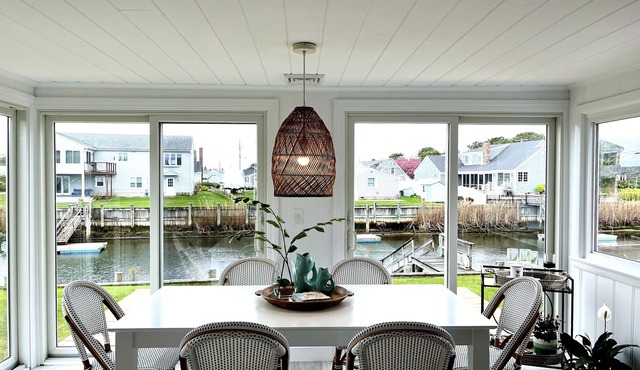 Newly furnished, sunny waterfront house with dock and walking distance to beach!