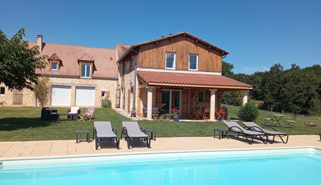 Newly rebuilt family home (July 2010) on 2 ha of land.