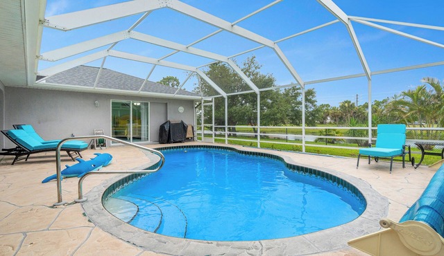 Newly Remodeled 4BR/3BR Canal Front Retreat w/Pool Near Golf Course & Beach FL